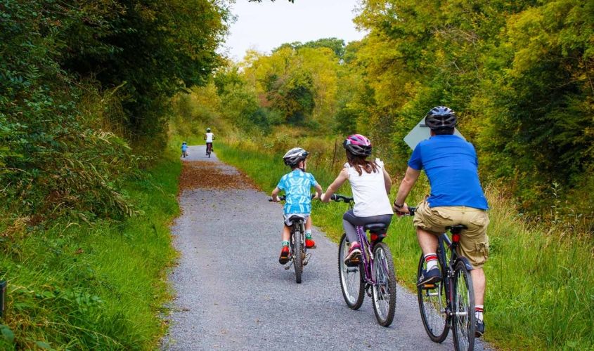 Family cycling along the blueway in Leitrim